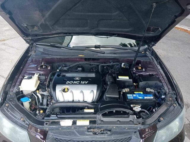 Коричневый Хендай Соната, объемом двигателя 2.4 л и пробегом 200 тыс. км за 4750 $, фото 1 на Automoto.ua