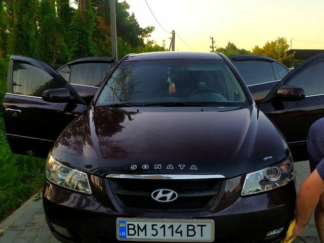 Коричневый Хендай Соната, объемом двигателя 2.4 л и пробегом 350 тыс. км за 4800 $, фото 2 на Automoto.ua