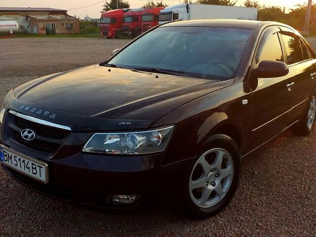 Коричневый Хендай Соната, объемом двигателя 2.4 л и пробегом 350 тыс. км за 4800 $, фото 4 на Automoto.ua