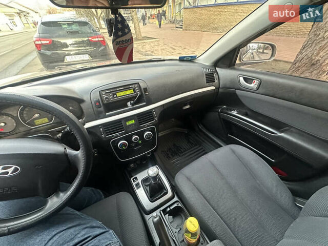 Коричневый Хендай Соната, объемом двигателя 2 л и пробегом 420 тыс. км за 5000 $, фото 20 на Automoto.ua