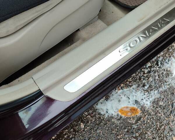 Коричневий Хендай Соната, об'ємом двигуна 2.36 л та пробігом 275 тис. км за 4800 $, фото 5 на Automoto.ua