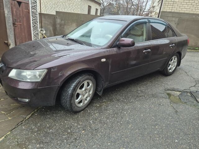 Коричневый Хендай Соната, объемом двигателя 2 л и пробегом 234 тыс. км за 4950 $, фото 2 на Automoto.ua