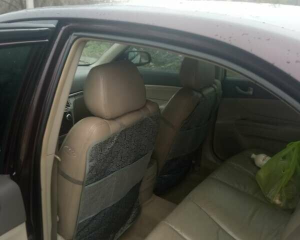 Коричневый Хендай Соната, объемом двигателя 2.4 л и пробегом 408 тыс. км за 5300 $, фото 10 на Automoto.ua