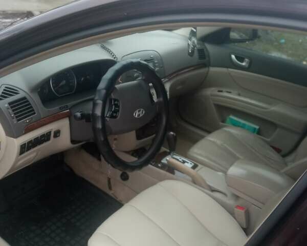 Коричневый Хендай Соната, объемом двигателя 2.4 л и пробегом 408 тыс. км за 5300 $, фото 6 на Automoto.ua