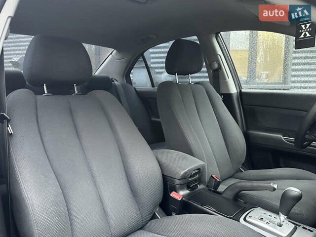 Коричневый Хендай Соната, объемом двигателя 2 л и пробегом 243 тыс. км за 5950 $, фото 24 на Automoto.ua