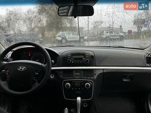 Коричневый Хендай Соната, объемом двигателя 2 л и пробегом 243 тыс. км за 5950 $, фото 12 на Automoto.ua