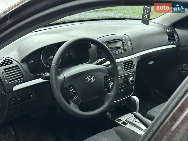 Коричневый Хендай Соната, объемом двигателя 2 л и пробегом 243 тыс. км за 5950 $, фото 16 на Automoto.ua