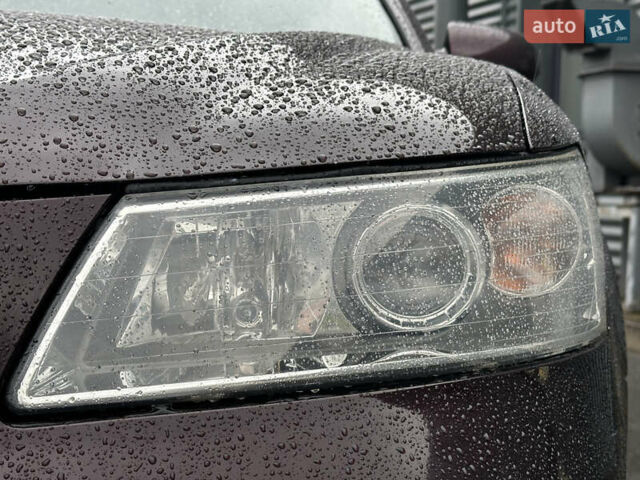 Коричневый Хендай Соната, объемом двигателя 2 л и пробегом 243 тыс. км за 5950 $, фото 1 на Automoto.ua