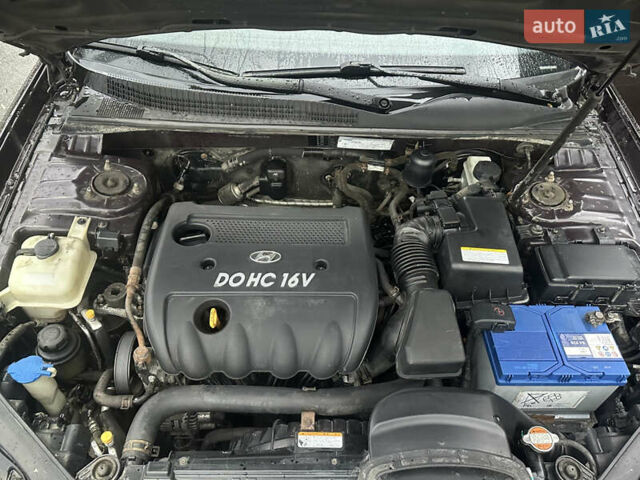 Коричневый Хендай Соната, объемом двигателя 2 л и пробегом 243 тыс. км за 5950 $, фото 14 на Automoto.ua