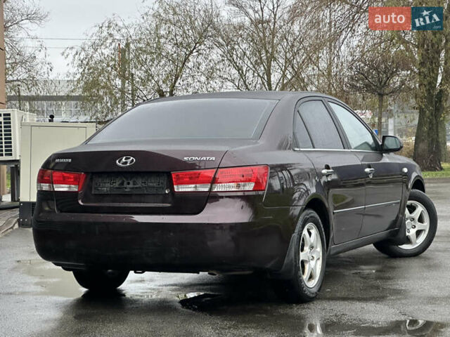 Коричневый Хендай Соната, объемом двигателя 2 л и пробегом 243 тыс. км за 5950 $, фото 10 на Automoto.ua