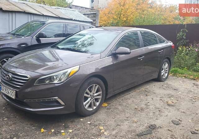 Коричневий Хендай Соната, об'ємом двигуна 2.4 л та пробігом 100 тис. км за 12000 $, фото 4 на Automoto.ua