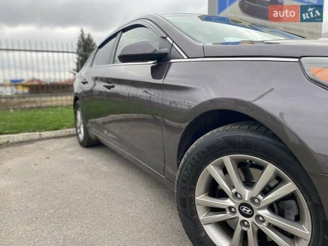 Коричневый Хендай Соната, объемом двигателя 2.36 л и пробегом 140 тыс. км за 8699 $, фото 4 на Automoto.ua