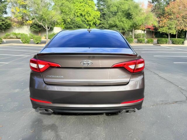 Коричневый Хендай Соната, объемом двигателя 2.4 л и пробегом 66 тыс. км за 6800 $, фото 5 на Automoto.ua