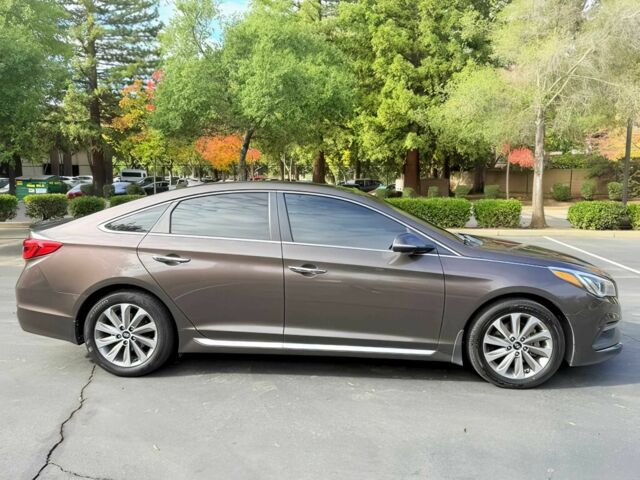 Коричневый Хендай Соната, объемом двигателя 2.4 л и пробегом 66 тыс. км за 6800 $, фото 7 на Automoto.ua