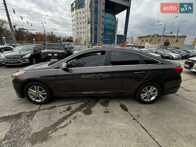 Коричневый Хендай Соната, объемом двигателя 2.4 л и пробегом 129 тыс. км за 11990 $, фото 1 на Automoto.ua