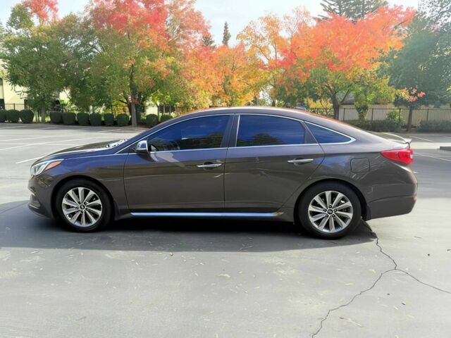 Коричневый Хендай Соната, объемом двигателя 2.4 л и пробегом 66 тыс. км за 6800 $, фото 3 на Automoto.ua