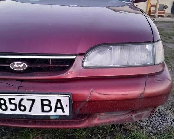 Червоний Хендай Соната, об'ємом двигуна 2 л та пробігом 206 тис. км за 1000 $, фото 16 на Automoto.ua