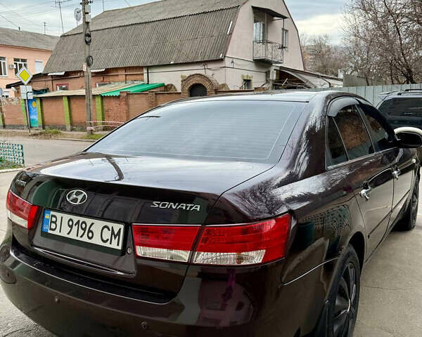 Красный Хендай Соната, объемом двигателя 2.4 л и пробегом 253 тыс. км за 5500 $, фото 5 на Automoto.ua