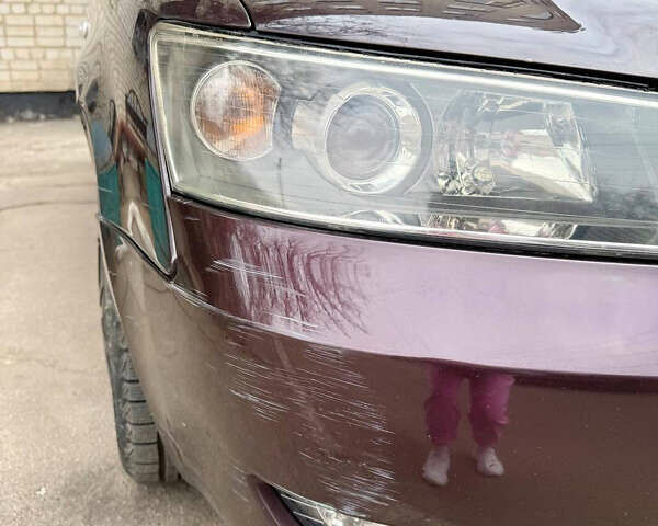 Красный Хендай Соната, объемом двигателя 2.4 л и пробегом 253 тыс. км за 5500 $, фото 8 на Automoto.ua