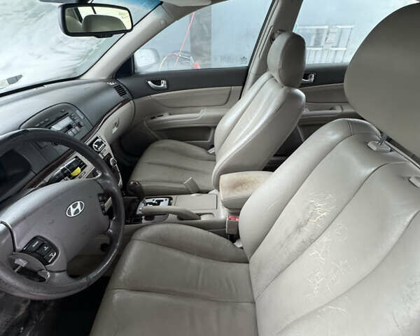 Красный Хендай Соната, объемом двигателя 3.34 л и пробегом 256 тыс. км за 5000 $, фото 5 на Automoto.ua