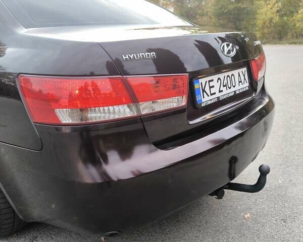 Красный Хендай Соната, объемом двигателя 2.36 л и пробегом 300 тыс. км за 3899 $, фото 10 на Automoto.ua