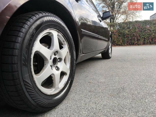 Красный Хендай Соната, объемом двигателя 2.36 л и пробегом 300 тыс. км за 3899 $, фото 13 на Automoto.ua