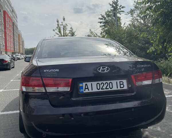 Красный Хендай Соната, объемом двигателя 2.36 л и пробегом 344 тыс. км за 5650 $, фото 4 на Automoto.ua