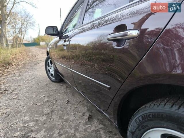 Червоний Хендай Соната, об'ємом двигуна 2 л та пробігом 280 тис. км за 4999 $, фото 16 на Automoto.ua