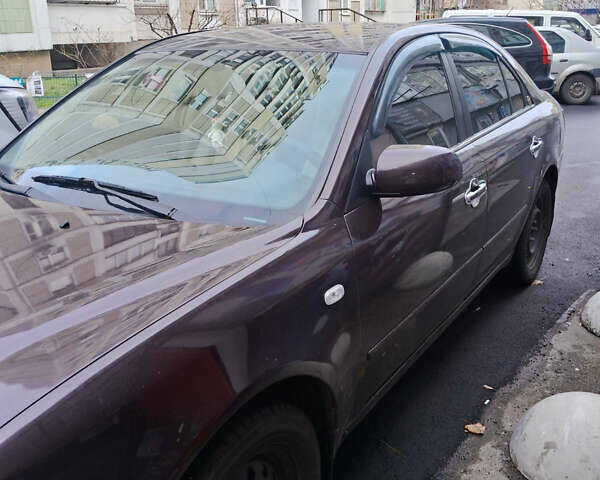 Красный Хендай Соната, объемом двигателя 2.36 л и пробегом 270 тыс. км за 6000 $, фото 6 на Automoto.ua