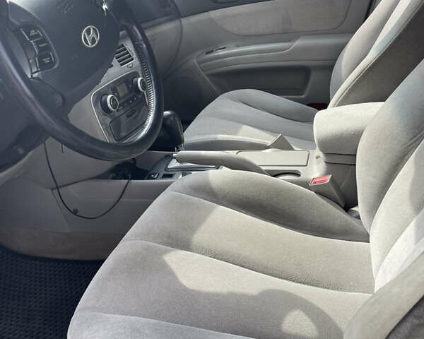 Красный Хендай Соната, объемом двигателя 2.36 л и пробегом 344 тыс. км за 5650 $, фото 8 на Automoto.ua