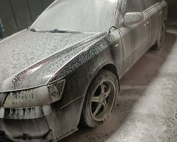 Красный Хендай Соната, объемом двигателя 2.4 л и пробегом 302 тыс. км за 6000 $, фото 6 на Automoto.ua