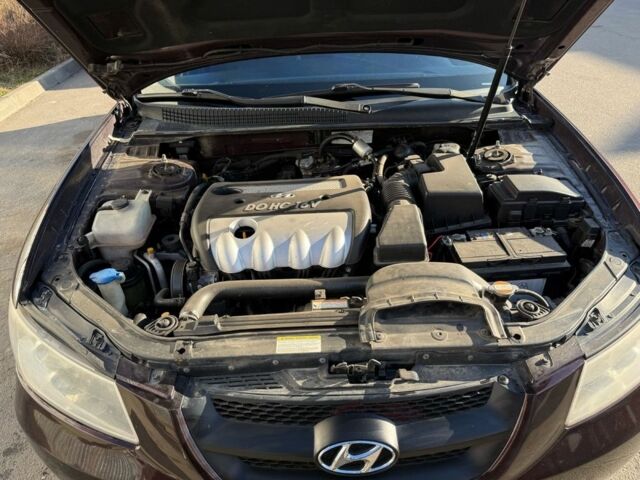 Красный Хендай Соната, объемом двигателя 2 л и пробегом 260 тыс. км за 4700 $, фото 6 на Automoto.ua