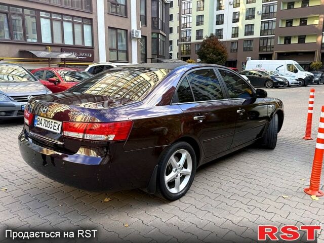 Червоний Хендай Соната, об'ємом двигуна 2.4 л та пробігом 270 тис. км за 6300 $, фото 4 на Automoto.ua