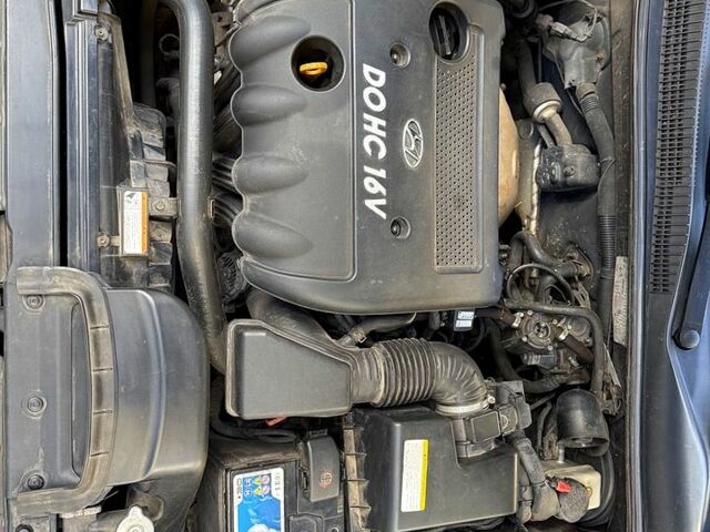 Червоний Хендай Соната, об'ємом двигуна 2.4 л та пробігом 270 тис. км за 6300 $, фото 5 на Automoto.ua