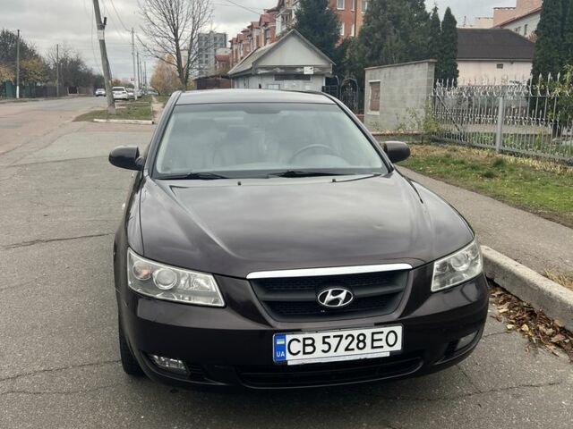 Красный Хендай Соната, объемом двигателя 2.4 л и пробегом 252 тыс. км за 5800 $, фото 1 на Automoto.ua