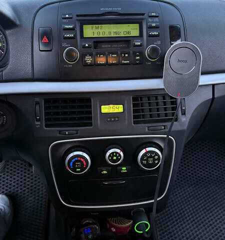 Червоний Хендай Соната, об'ємом двигуна 2 л та пробігом 225 тис. км за 5000 $, фото 21 на Automoto.ua