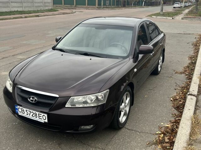 Красный Хендай Соната, объемом двигателя 2.4 л и пробегом 252 тыс. км за 5800 $, фото 3 на Automoto.ua