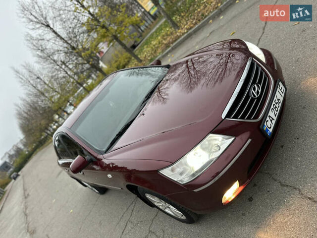 Красный Хендай Соната, объемом двигателя 2 л и пробегом 240 тыс. км за 5300 $, фото 13 на Automoto.ua