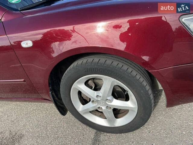 Червоний Хендай Соната, об'ємом двигуна 2.36 л та пробігом 217 тис. км за 5750 $, фото 19 на Automoto.ua