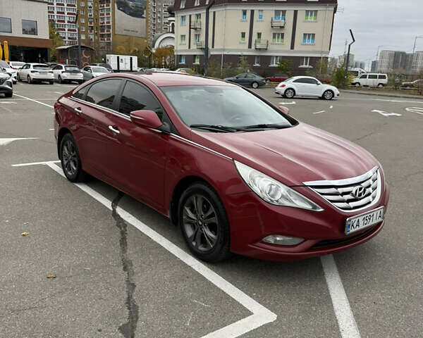 Червоний Хендай Соната, об'ємом двигуна 2.36 л та пробігом 189 тис. км за 8699 $, фото 2 на Automoto.ua