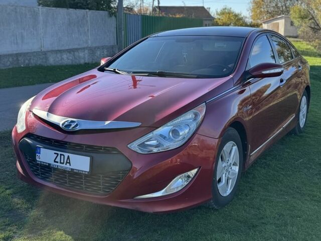 Красный Хендай Соната, объемом двигателя 2.4 л и пробегом 255 тыс. км за 8750 $, фото 1 на Automoto.ua