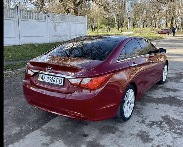 Красный Хендай Соната, объемом двигателя 2.4 л и пробегом 133 тыс. км за 10500 $, фото 1 на Automoto.ua