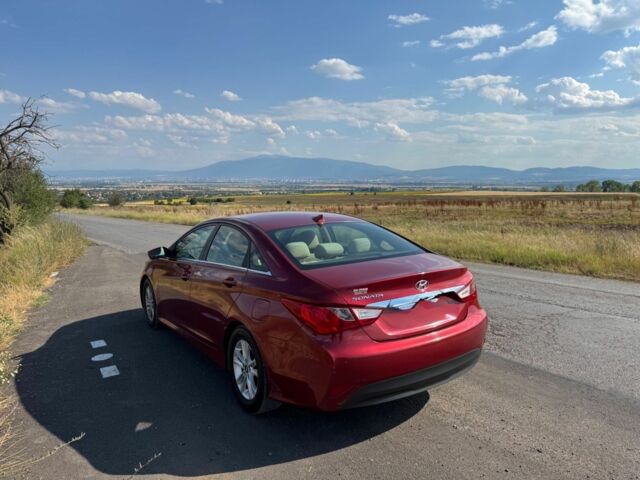 Красный Хендай Соната, объемом двигателя 2.4 л и пробегом 104 тыс. км за 9000 $, фото 1 на Automoto.ua