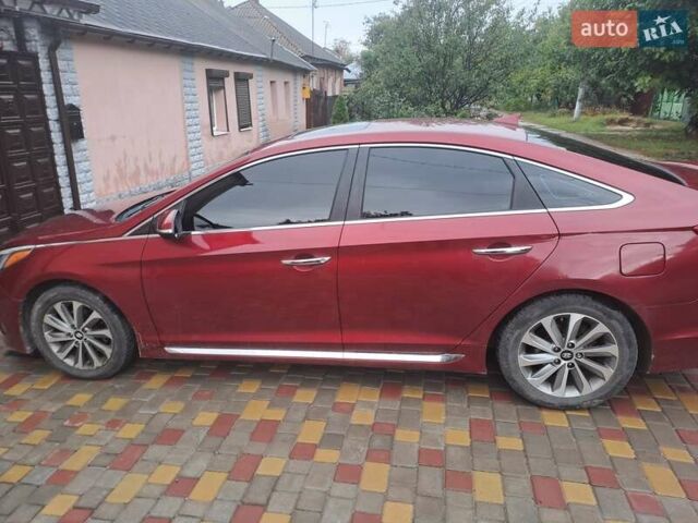 Красный Хендай Соната, объемом двигателя 2.36 л и пробегом 85 тыс. км за 10200 $, фото 1 на Automoto.ua