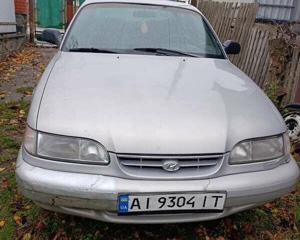 Серый Хендай Соната, объемом двигателя 2 л и пробегом 673 тыс. км за 1300 $, фото 6 на Automoto.ua