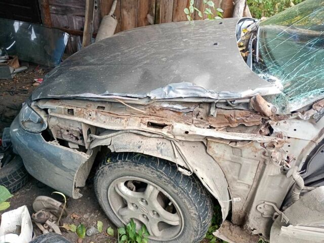 Сірий Хендай Соната, об'ємом двигуна 2 л та пробігом 187 тис. км за 1100 $, фото 5 на Automoto.ua