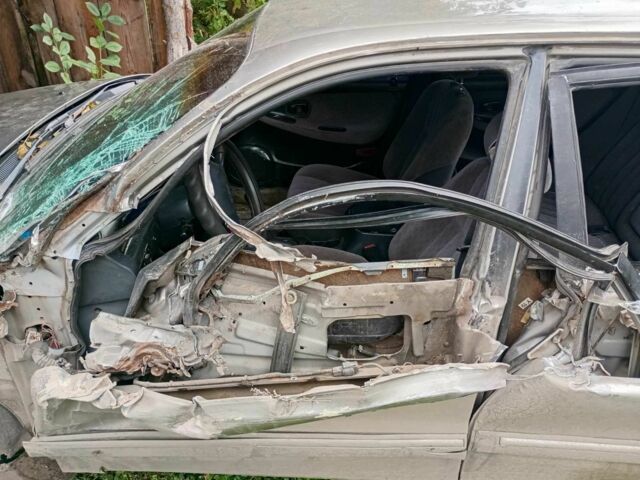 Сірий Хендай Соната, об'ємом двигуна 2 л та пробігом 187 тис. км за 1100 $, фото 11 на Automoto.ua