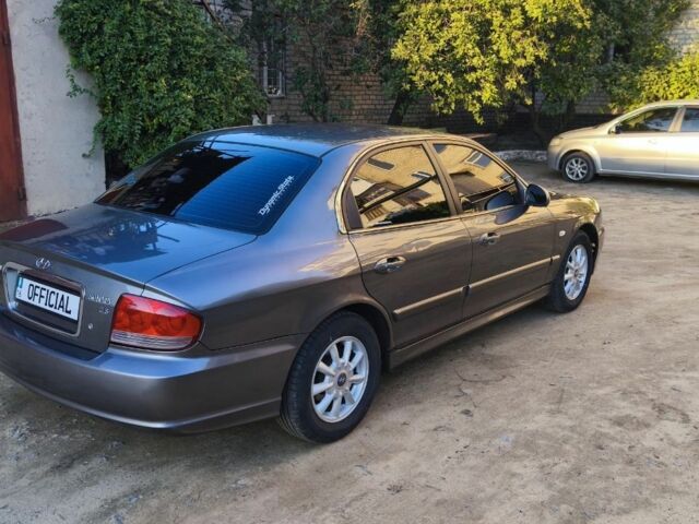 Серый Хендай Соната, объемом двигателя 2 л и пробегом 236 тыс. км за 3700 $, фото 7 на Automoto.ua