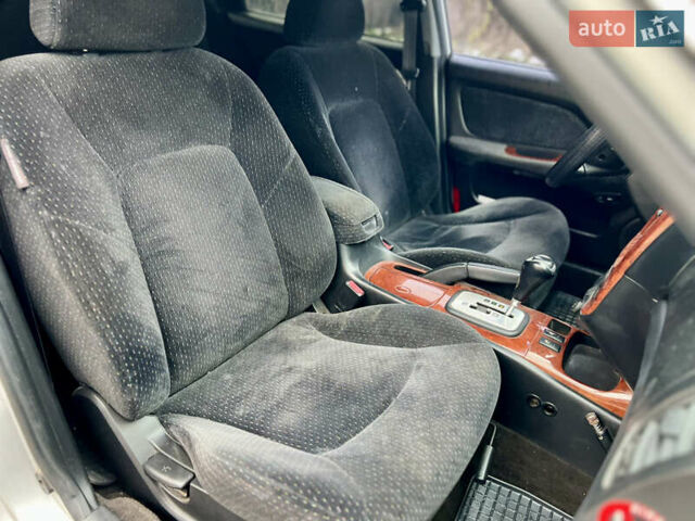 Сірий Хендай Соната, об'ємом двигуна 2 л та пробігом 255 тис. км за 2999 $, фото 32 на Automoto.ua
