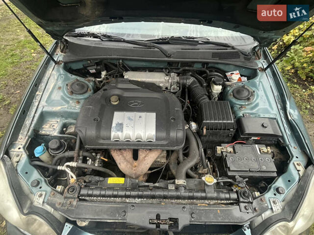 Серый Хендай Соната, объемом двигателя 2 л и пробегом 270 тыс. км за 1650 $, фото 8 на Automoto.ua